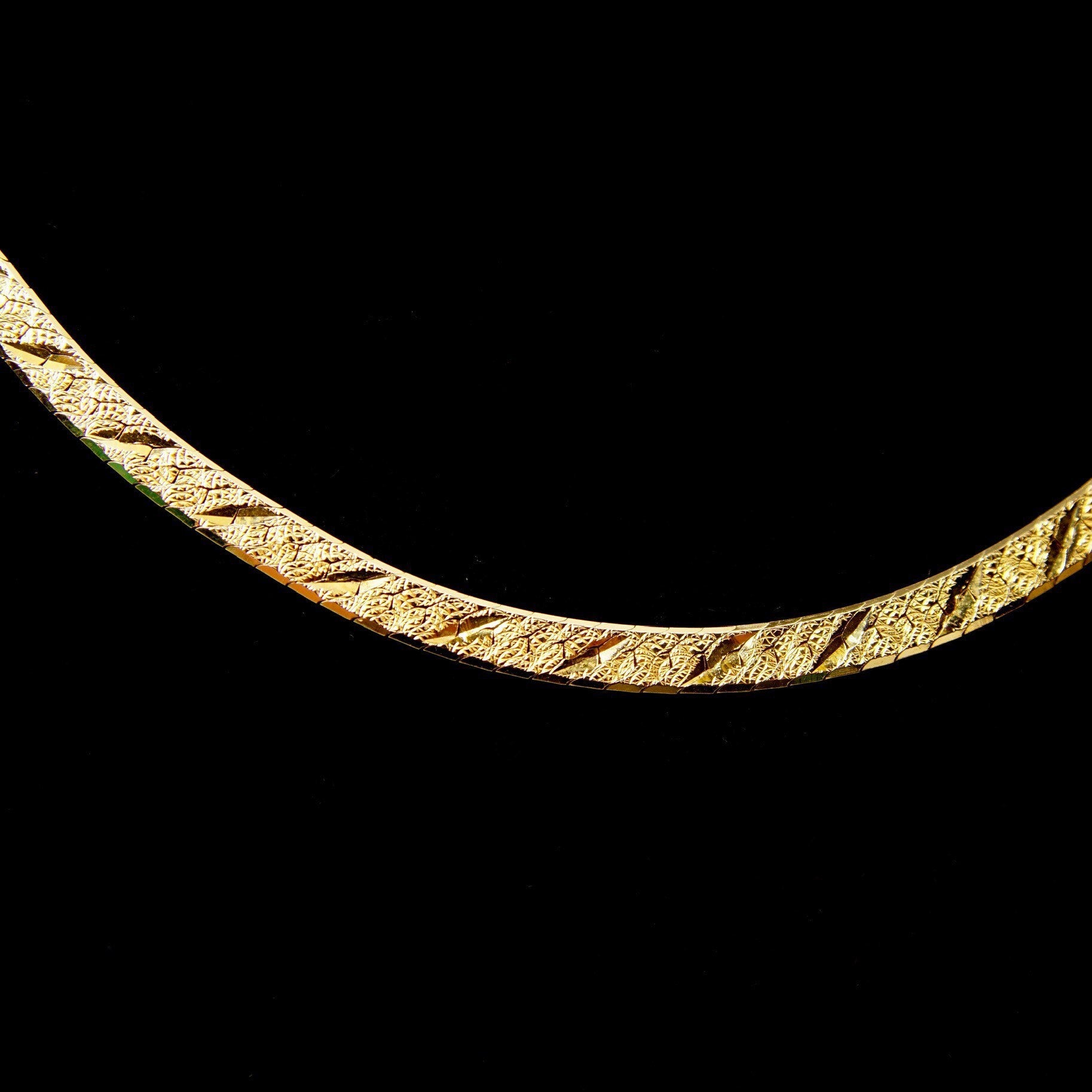 14K yellow gold Italian Modernist herringbone chain necklace with diamond-cut texture, reversible design, 3.5mm width and 20 inch length, shown on black background