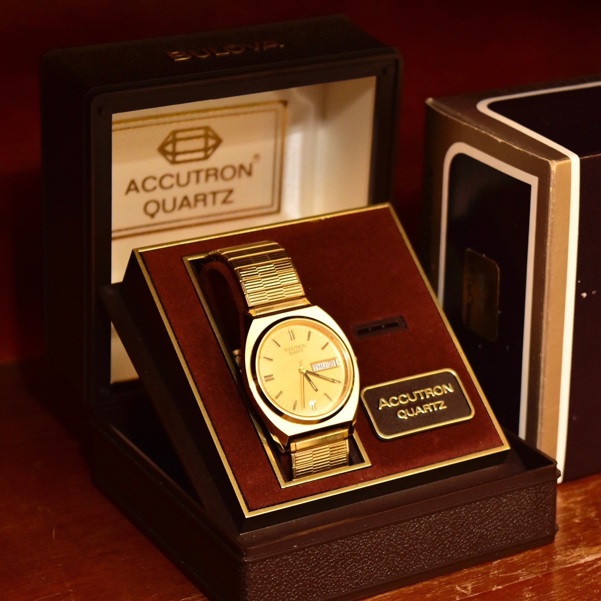 Vintage 1988 Bulova Accutron Gold Tone Swiss Quartz Day/Date Wristwatch W/ Original Box & Papers, Speidel Two-Tone Stretch Band, 7"