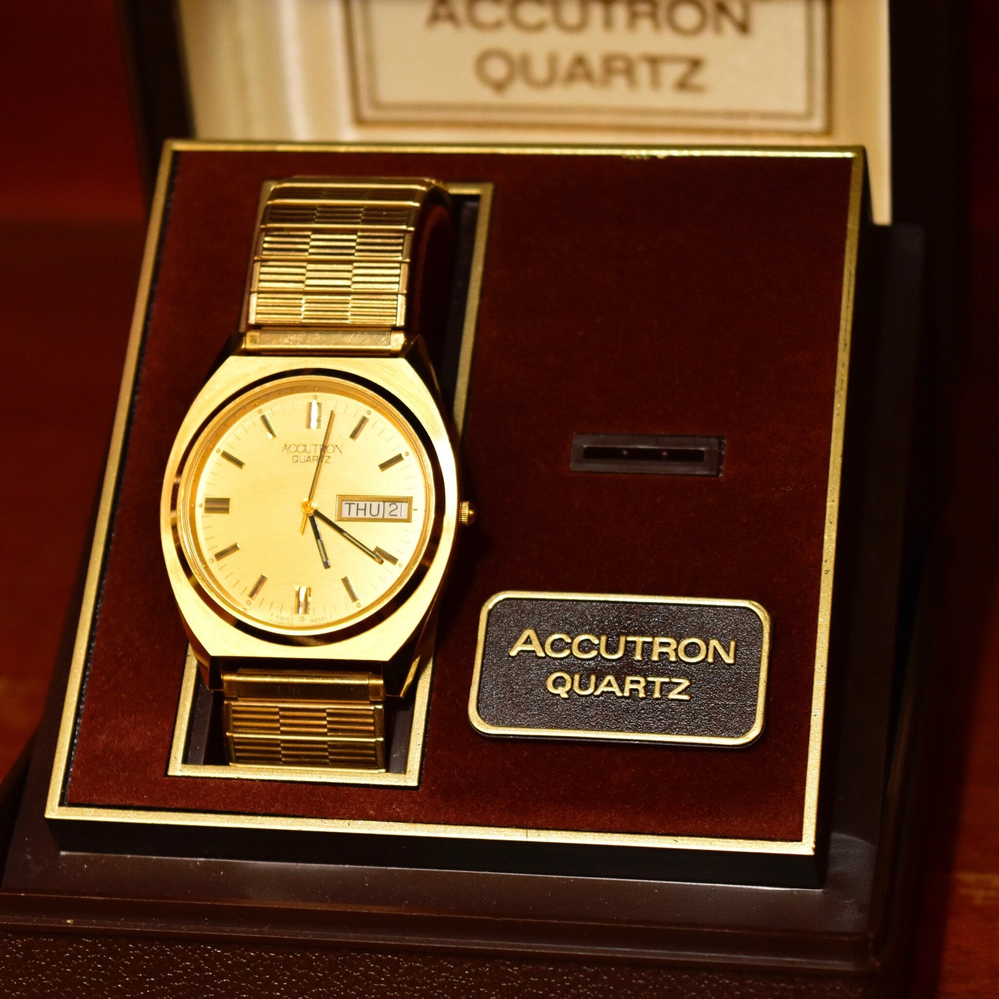 Vintage 1988 Bulova Accutron Gold Tone Swiss Quartz Day/Date Wristwatch W/ Original Box & Papers, Speidel Two-Tone Stretch Band, 7"