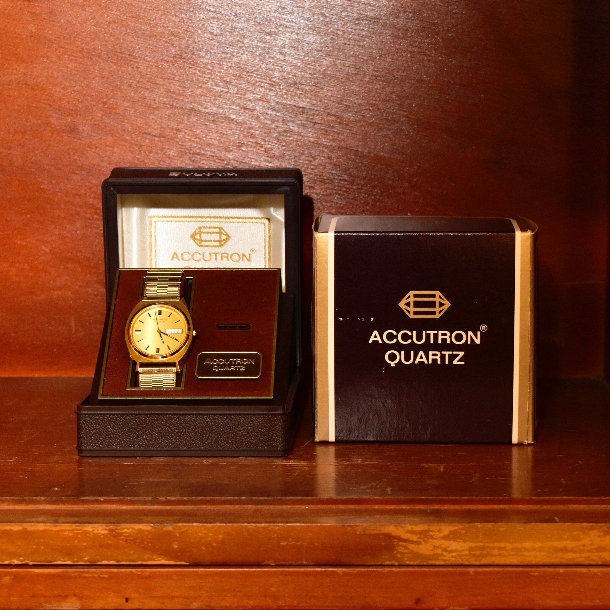 Vintage 1988 Bulova Accutron Gold Tone Swiss Quartz Day/Date Wristwatch W/ Original Box & Papers, Speidel Two-Tone Stretch Band, 7"
