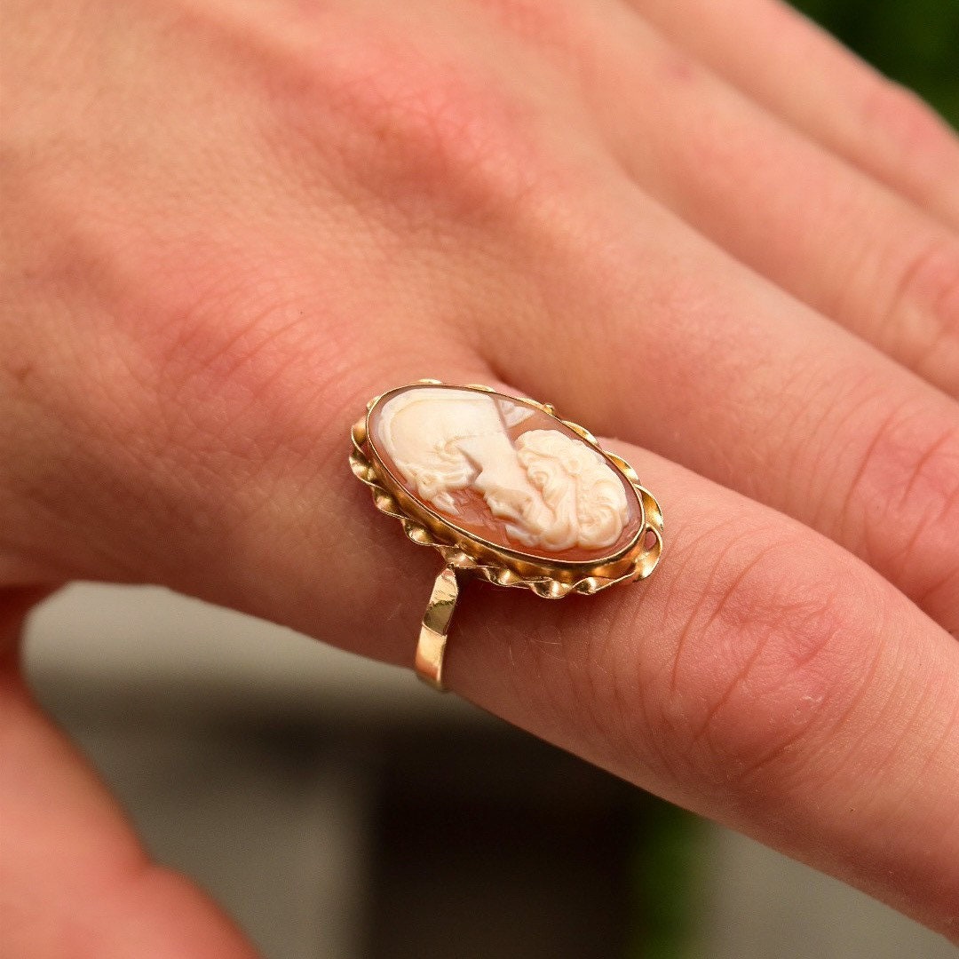Vintage 10K Gold Cameo Ring with Classic Relief Shell Carving in Elongated Oval Shape on Hand, Yellow Gold Ribbon Setting, Size 10 US.