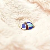 Vintage sterling silver multi-stone inlay flip ring featuring lapis lazuli, turquoise, and carnelian in a colorful scarab beetle design, size 8 US
