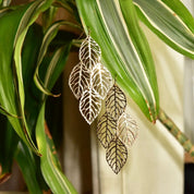 Ornate Gold-Toned Layered Hollow Leaf Dangle Earrings