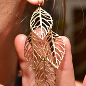 Ornate Gold-Toned Layered Hollow Leaf Dangle Earrings