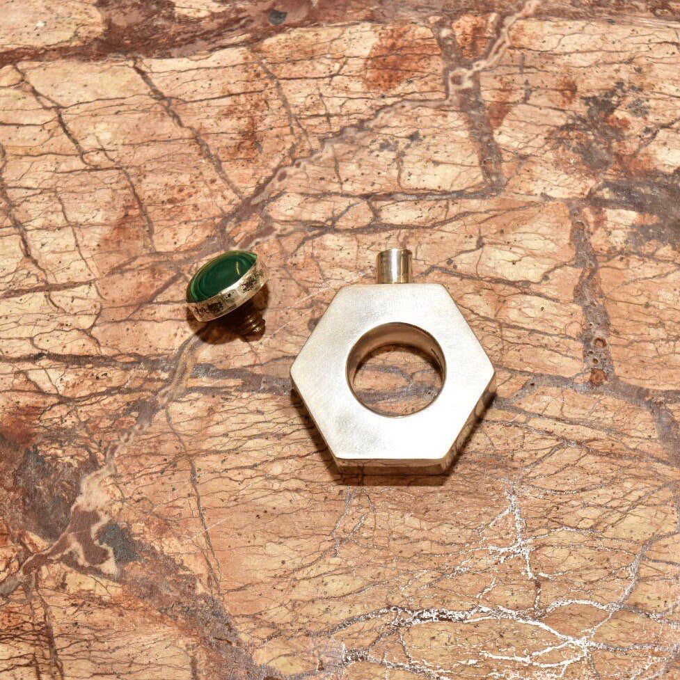 Vintage TAXCO modernist sterling silver hexagonal perfume bottle with malachite stone top, made in Mexico, measuring 2 inches tall, stamped TA-187 hallmark.