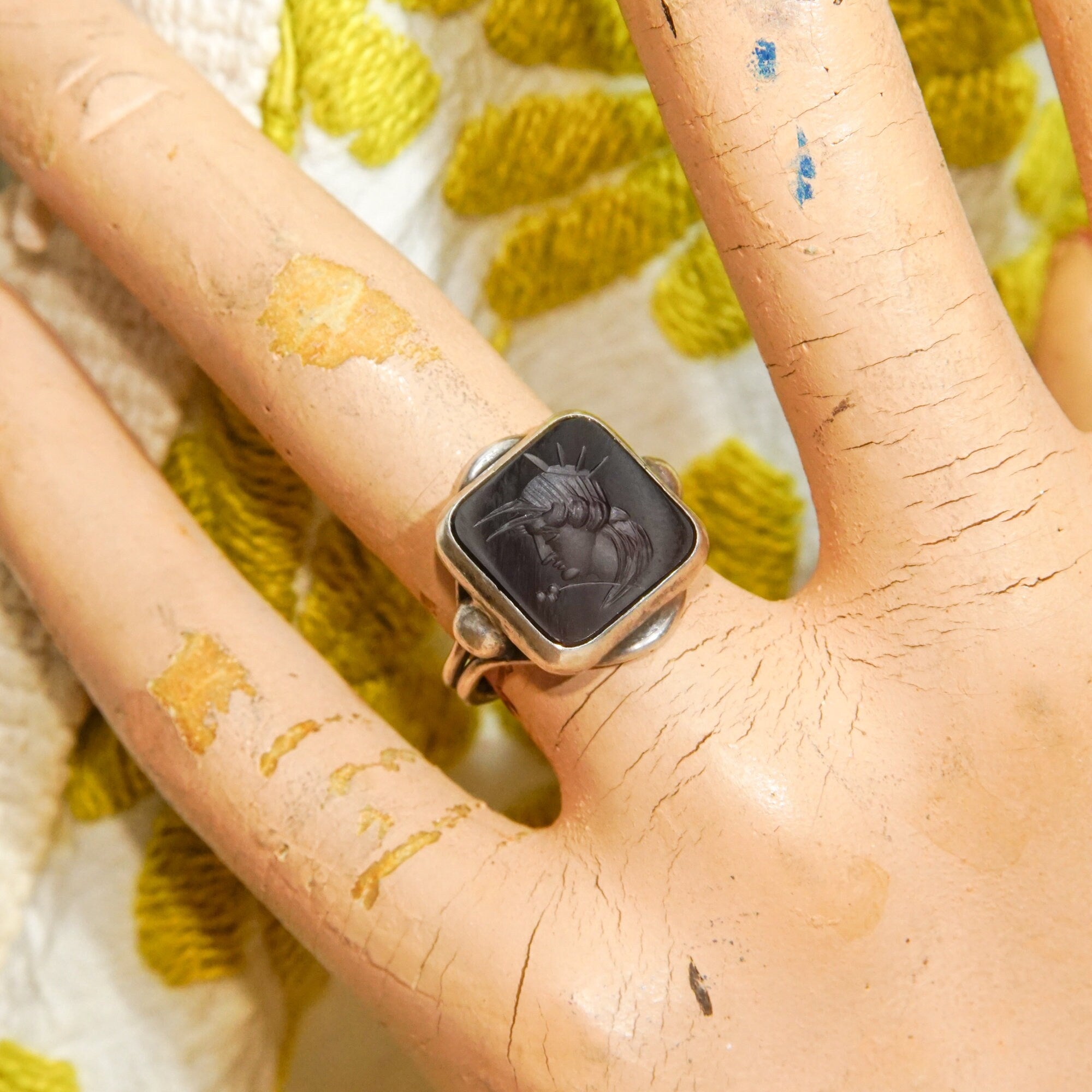 Antique-styled black agate cameo seal ring featuring a carved Roman warrior profile, set in sterling silver. Men's pinky signet ring, size 6 US.