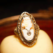 Antique 14K white gold filigree ring with carved shell cameo featuring a woman's bust wearing a diamond necklace, diamond accents, ESEMCO hallmark, size 6 1/4 US.