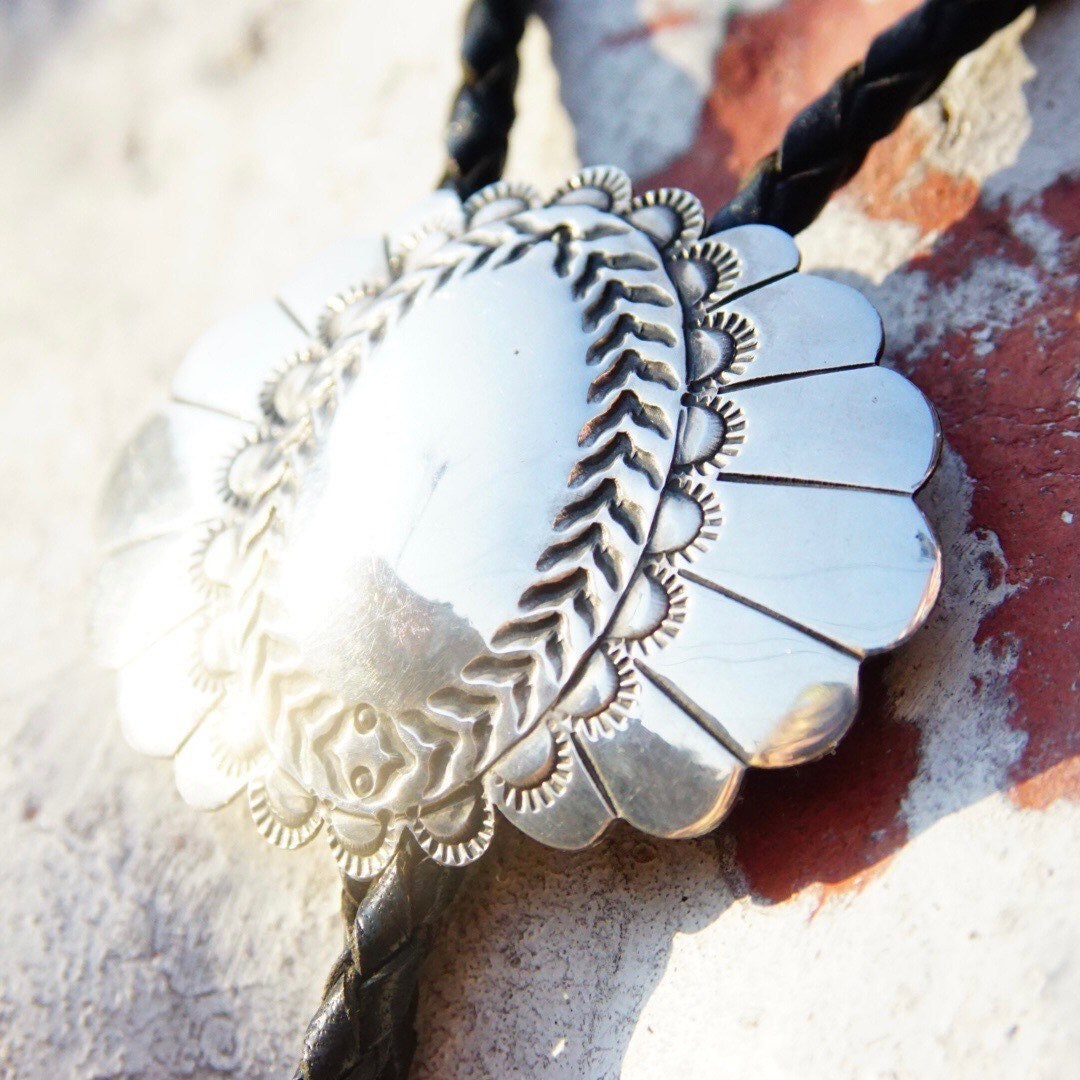 Vintage 1989 Signed Navajo Concho Bolo Tie, Hammered Silver Slide Clasp, Braided Black Leather, Silver Aglets, Native American Old Pawn