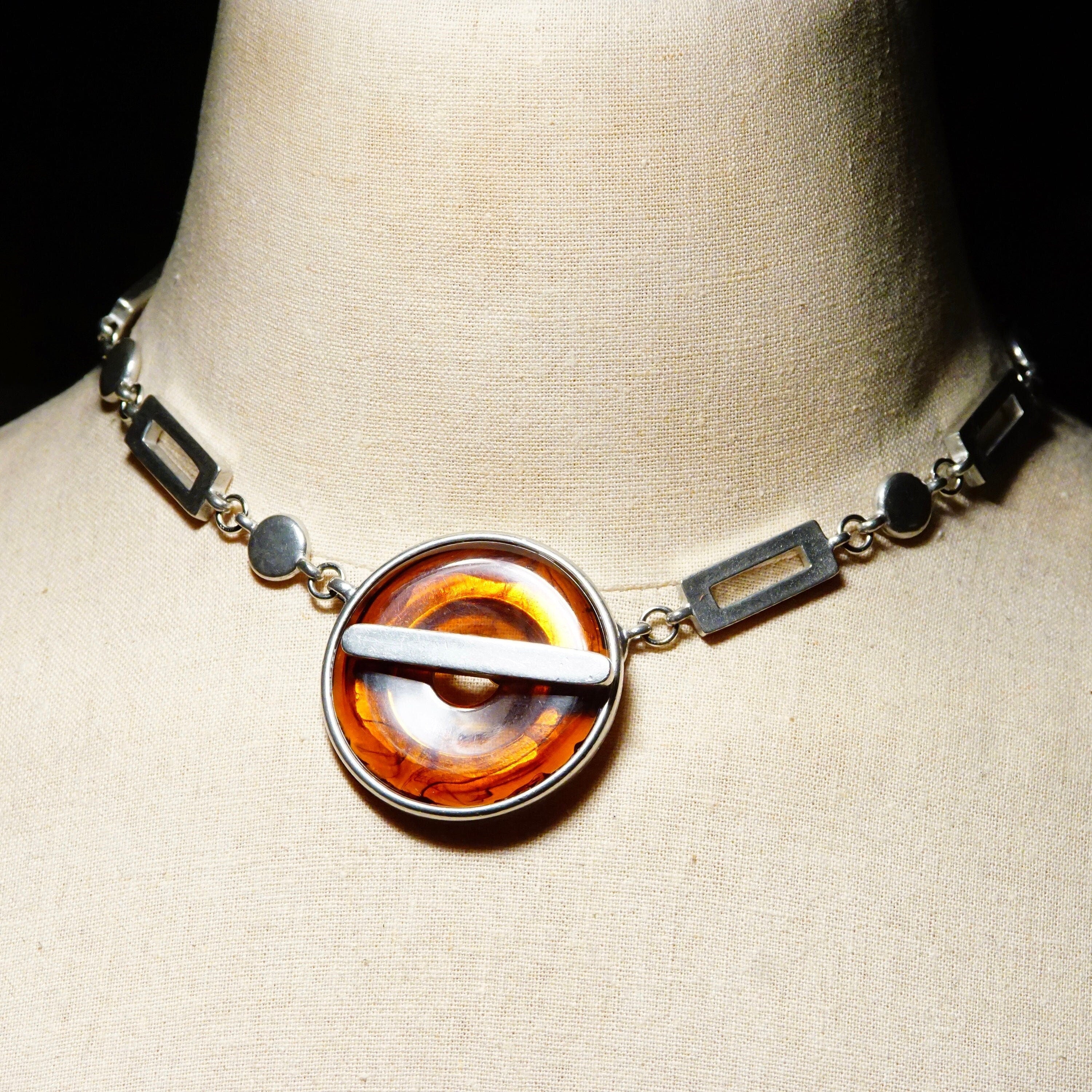 Vintage Modernist Ben Amun Amber Lucite Toggle Pendant Choker, Chunky Silver Necklace With Translucent Amber Donut Ring Pendant, 17 3/4" L