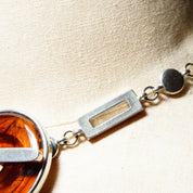 Vintage Modernist Ben Amun Amber Lucite Toggle Pendant Choker, Chunky Silver Necklace With Translucent Amber Donut Ring Pendant, 17 3/4" L