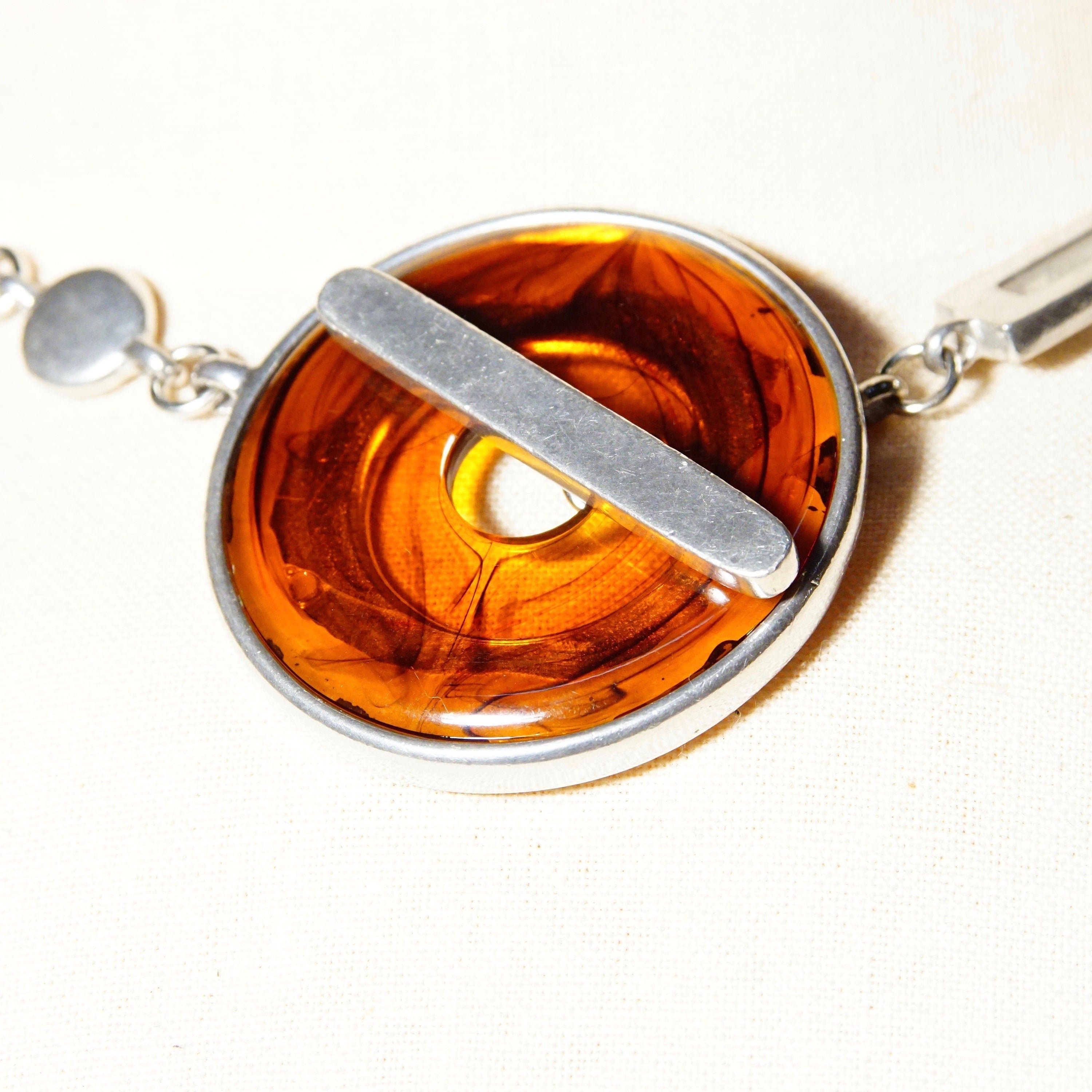 Vintage Modernist Ben Amun Amber Lucite Toggle Pendant Choker, Chunky Silver Necklace With Translucent Amber Donut Ring Pendant, 17 3/4" L