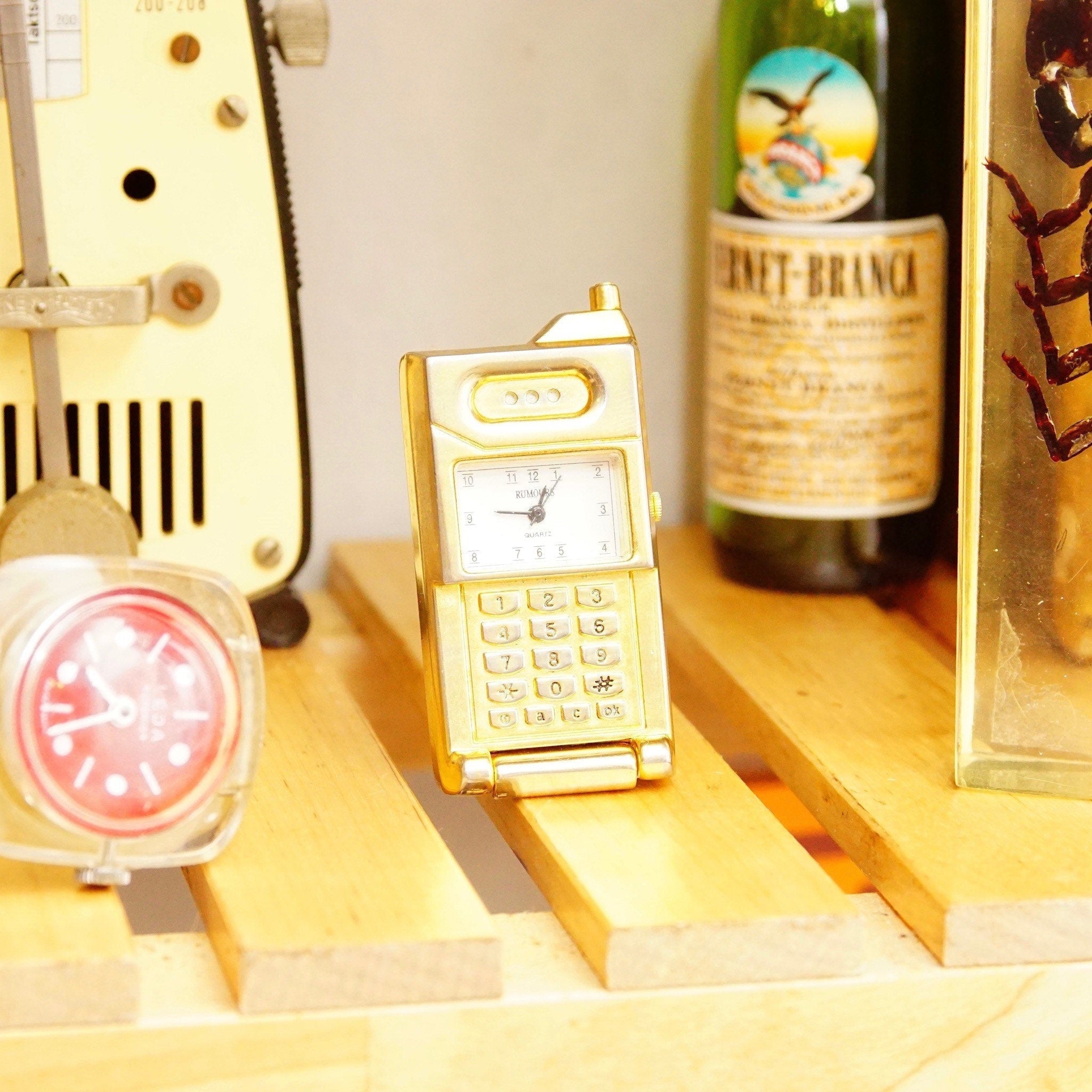 Vintage Rumors Quartz Miniature Brass Flip-Phone Mantel Clock, Small Standing Analog Clock, Cute Desk Tchotchke, Japan Movt, 2.5" Tall