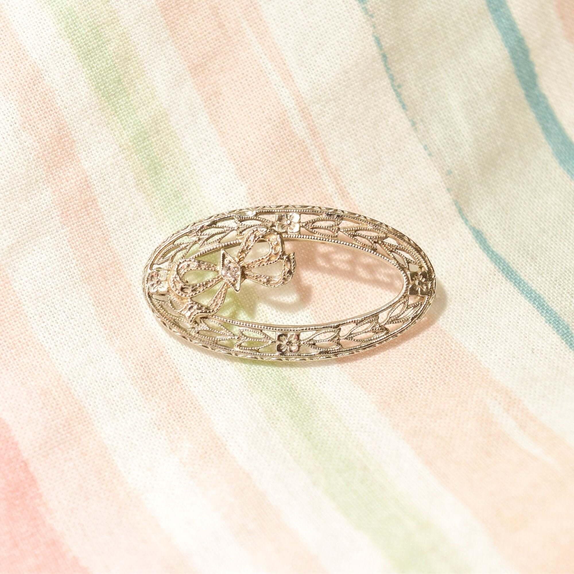 Art Deco 14K White Gold Filigree Diamond Ribbon Wreath Brooch, Ornate Oval Pin, Floral Motifs, 32mm - Good's Vintage