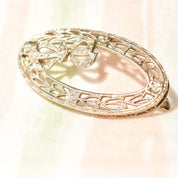 Art Deco 14K White Gold Filigree Diamond Ribbon Wreath Brooch, Ornate Oval Pin, Floral Motifs, 32mm - Good's Vintage