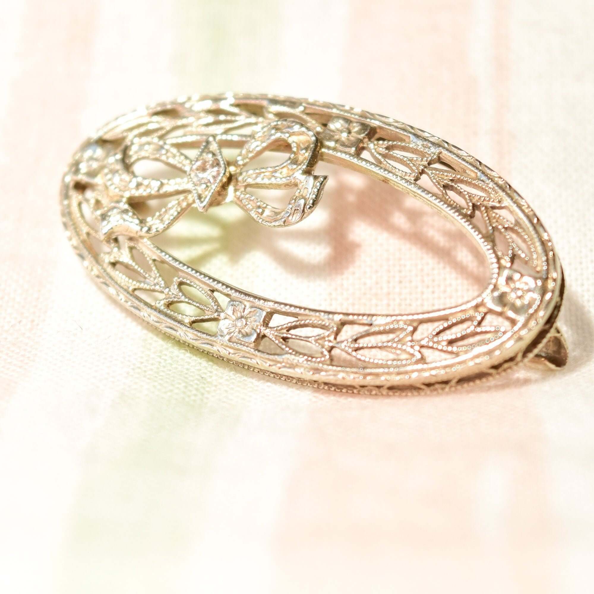 Art Deco 14K White Gold Filigree Diamond Ribbon Wreath Brooch, Ornate Oval Pin, Floral Motifs, 32mm - Good's Vintage