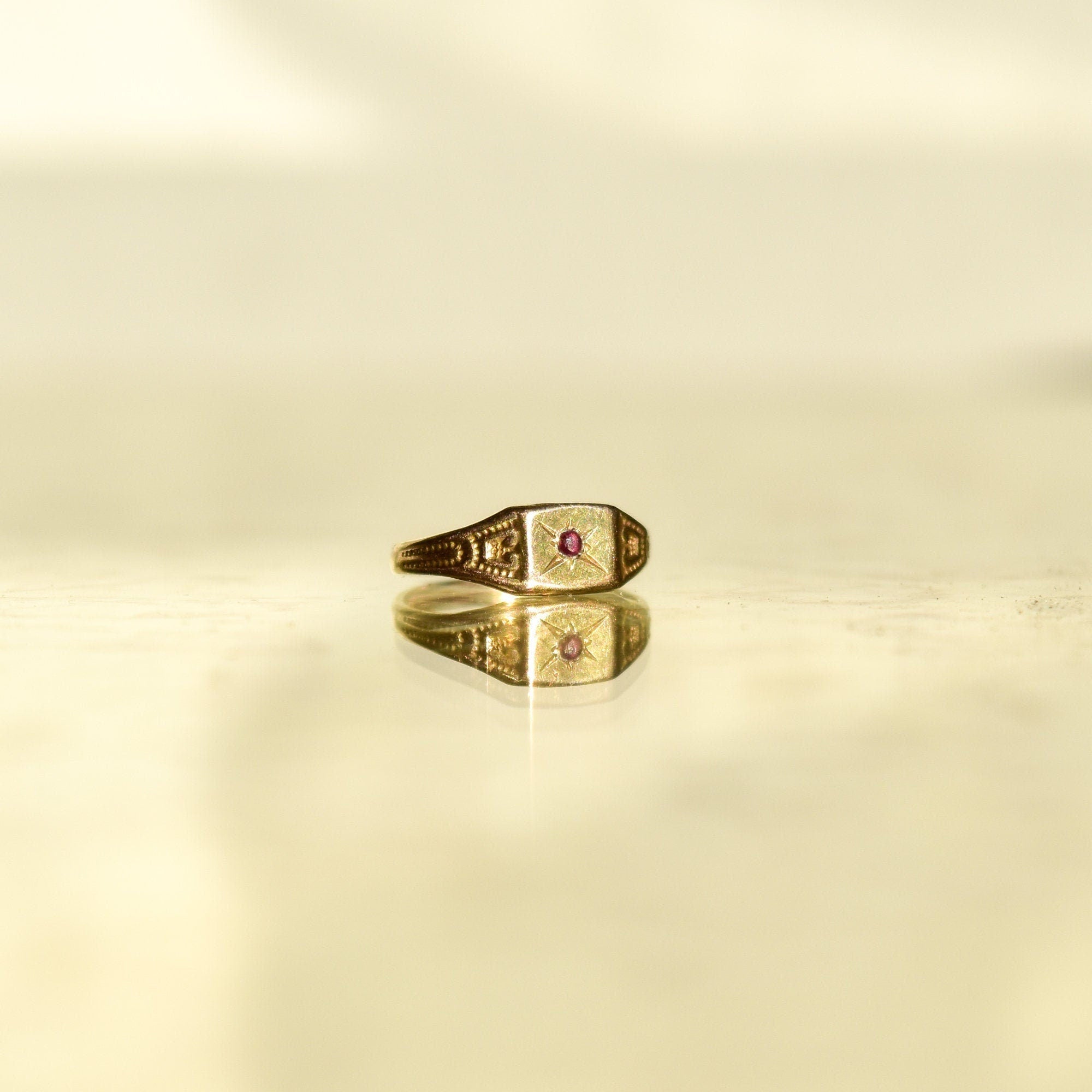 Victorian 10K Garnet Baby Ring In Antique Yellow Gold, Tiny Engraved Ring, Mourning Jewelry, Toe Ring - Good's Vintage