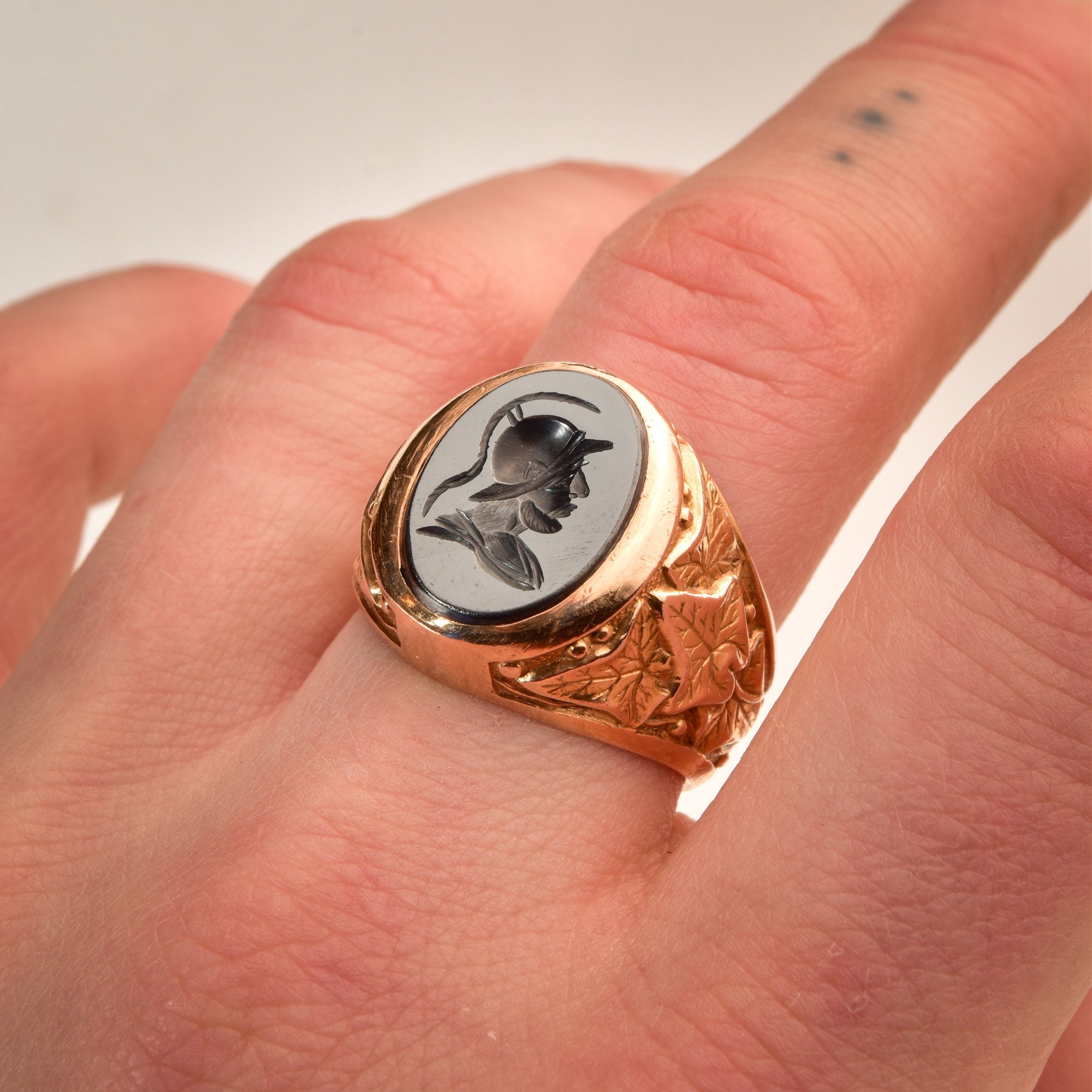 Men's 18K Hematite Intaglio Signet Ring, Gladiator Cameo Ring, Yellow Gold Leaf Motifs, Estate Jewelry, 9 US - Good's Vintage