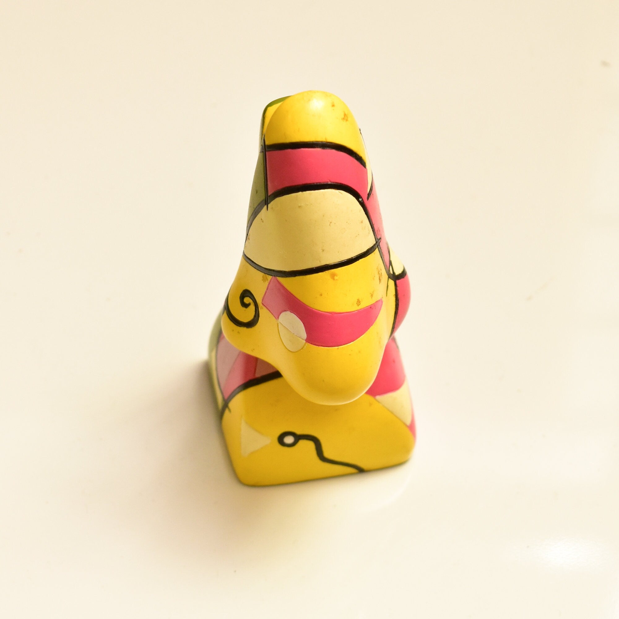 Colorful abstract resin eyeglass stand featuring Picasso-inspired nose and face design, measuring 3 3/4 inches tall, vintage home decor accessory for holding glasses.