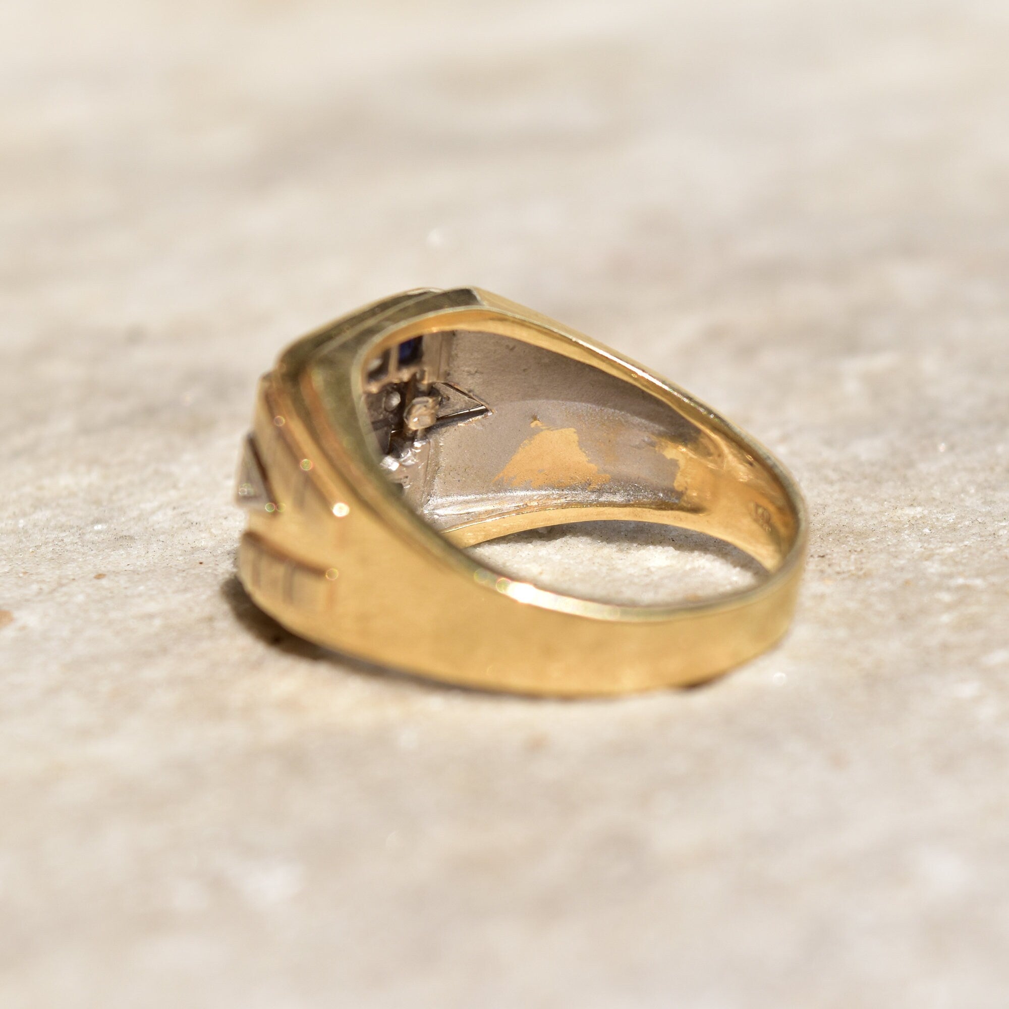 Vintage men's 14K gold signet ring with diamond and sapphire, featuring an engraved star setting, size 12 US, estate jewelry