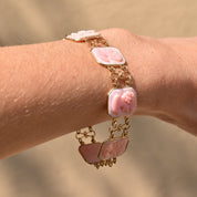 Italian 14K pink gold cameo link bracelet with square and oval links featuring carved shell cameos on the wrist against skin, estate jewelry signed M+M SCOGNAMIGLIO, measuring 7 1/4 inches long.