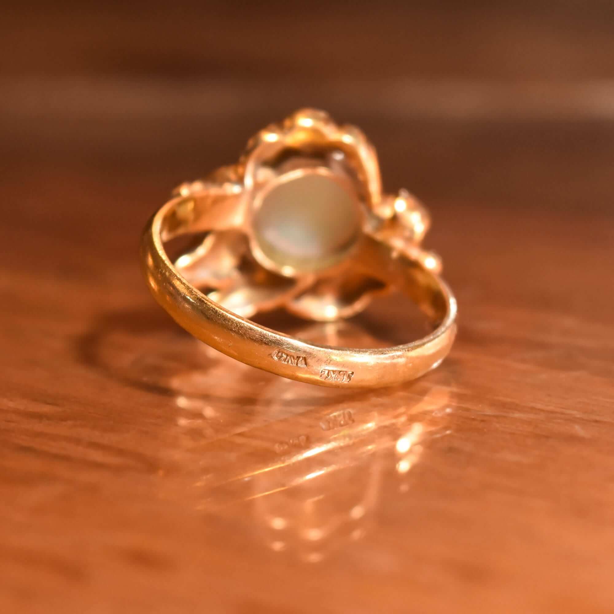 18K Gold Opal Cocktail Ring with Asymmetrical Leaf Setting