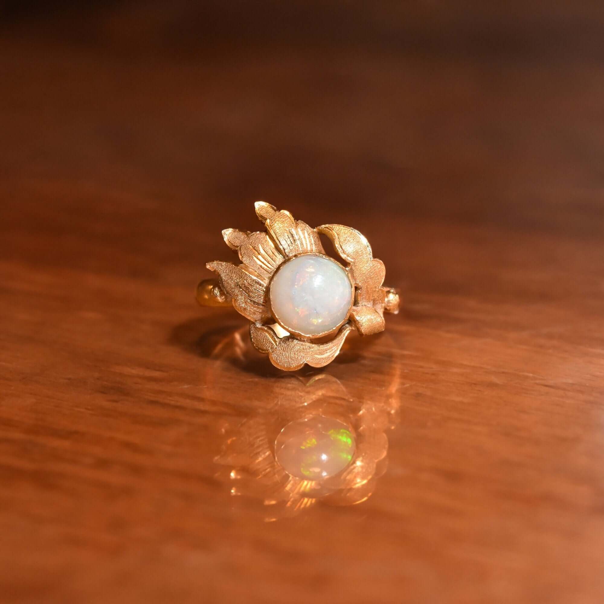 18K Gold Opal Cocktail Ring with Asymmetrical Leaf Setting