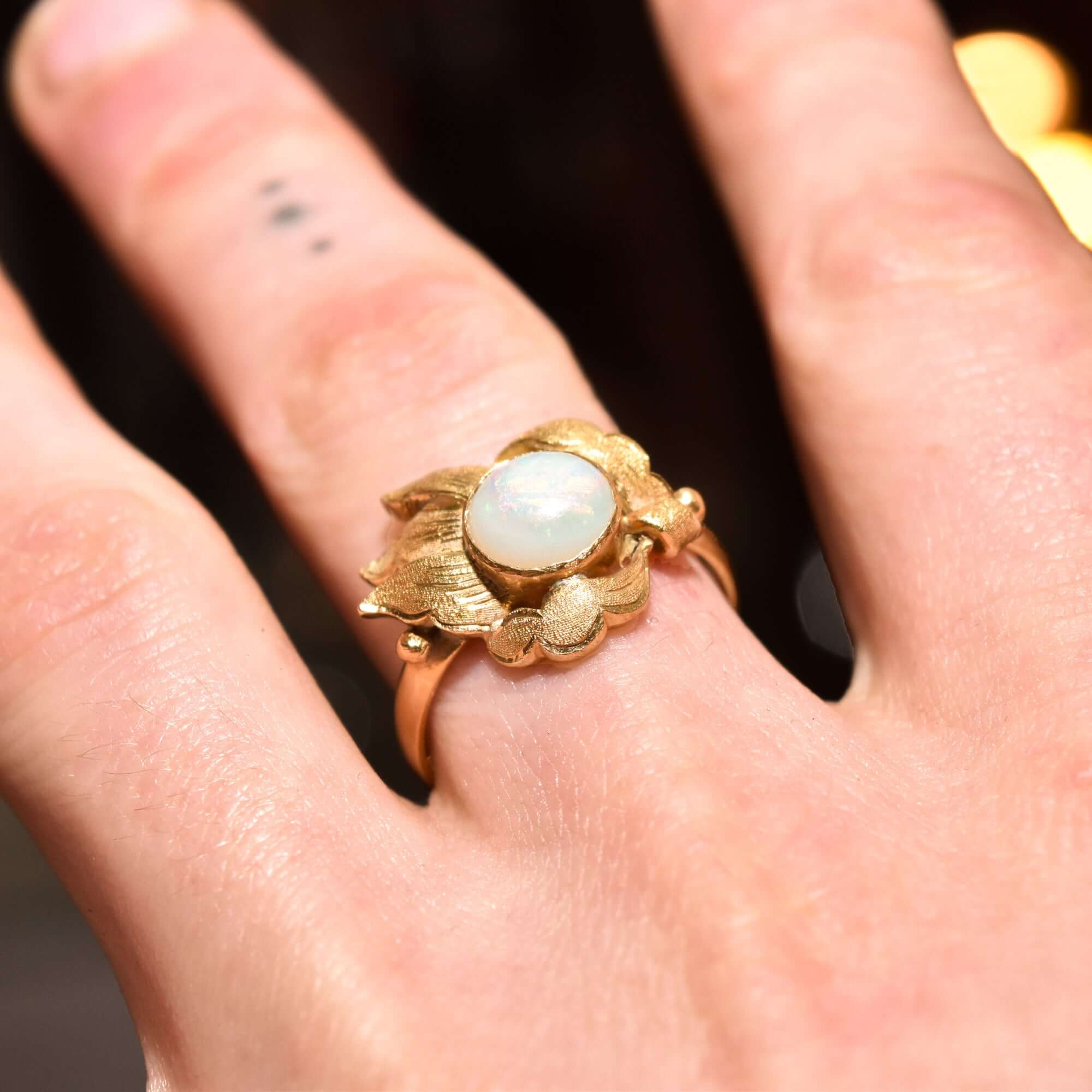 18K Gold Opal Cocktail Ring with Asymmetrical Leaf Setting