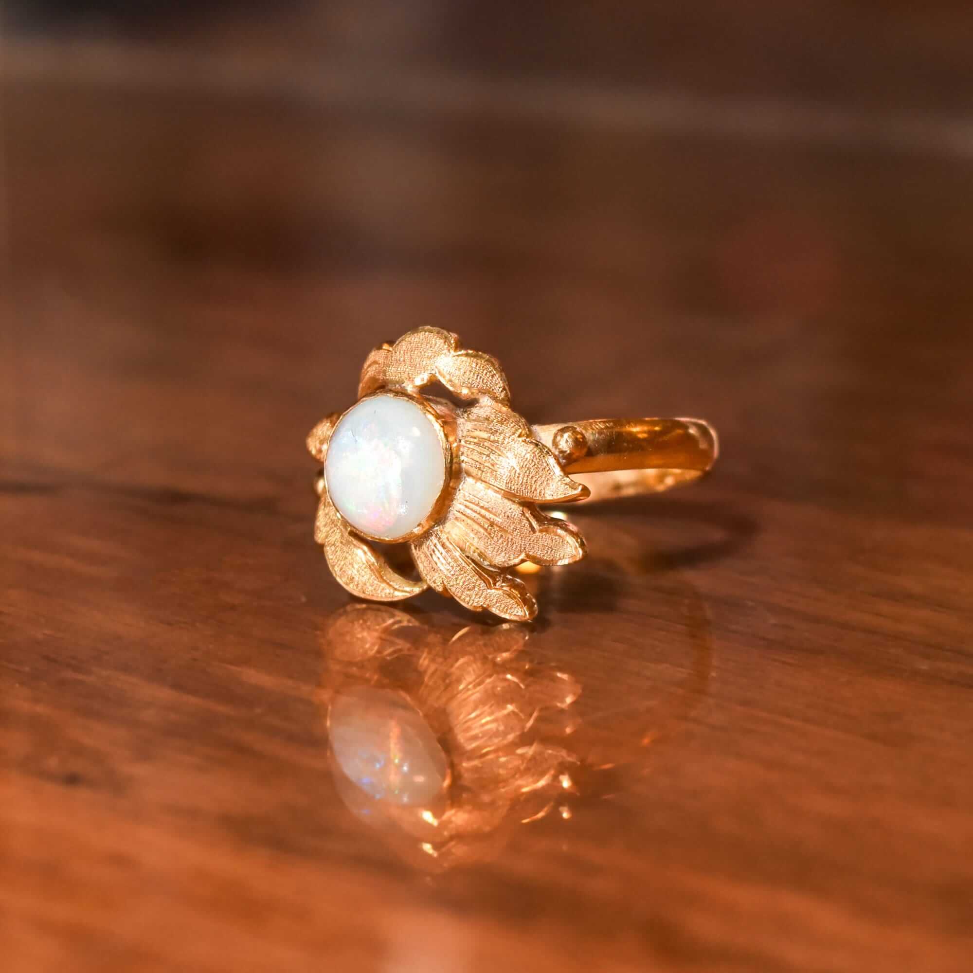18K Gold Opal Cocktail Ring with Asymmetrical Leaf Setting