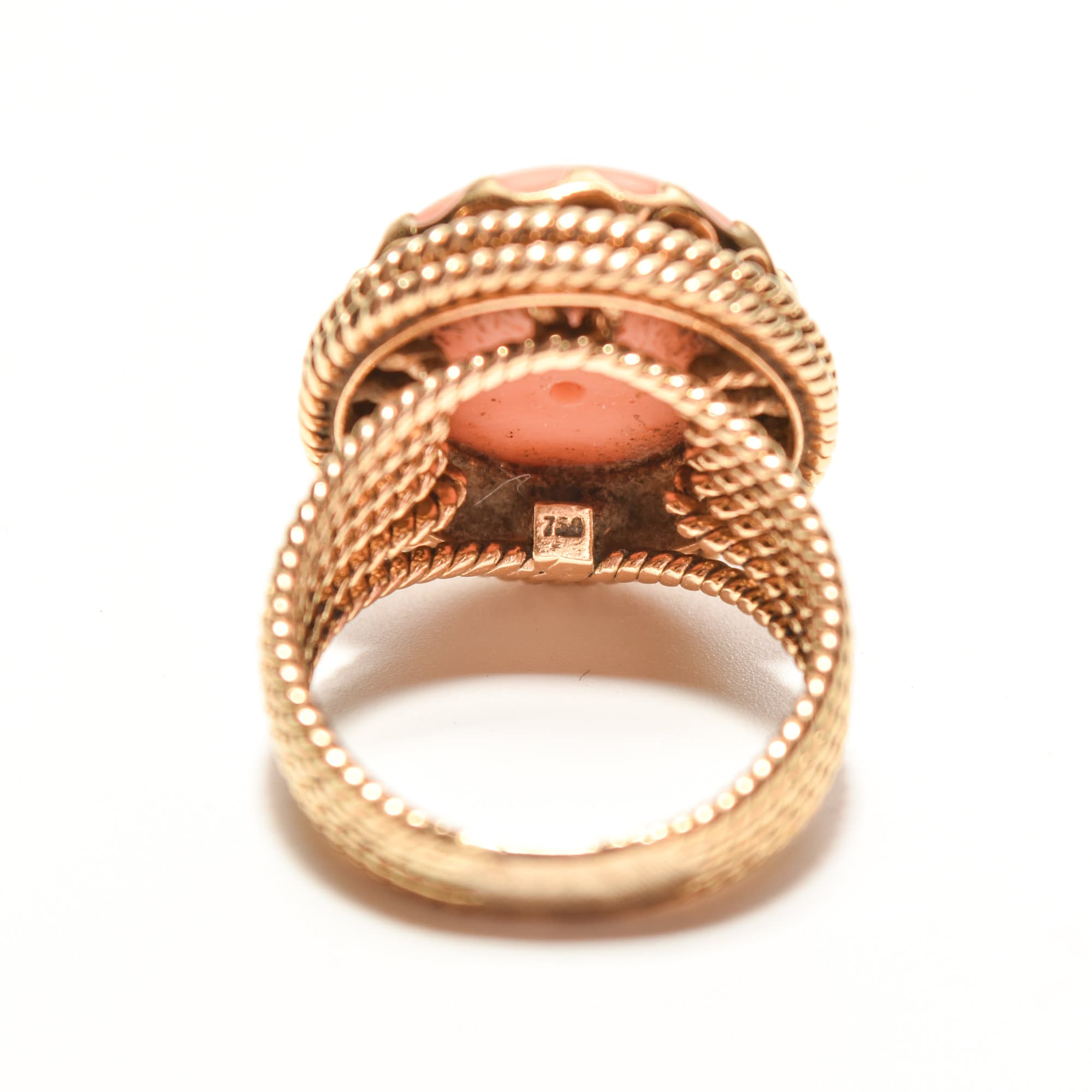 Estate Angel Skin Coral Cocktail Ring in 18K Yellow Gold with Woven Band Detail, Size 6.25 US, on White Background