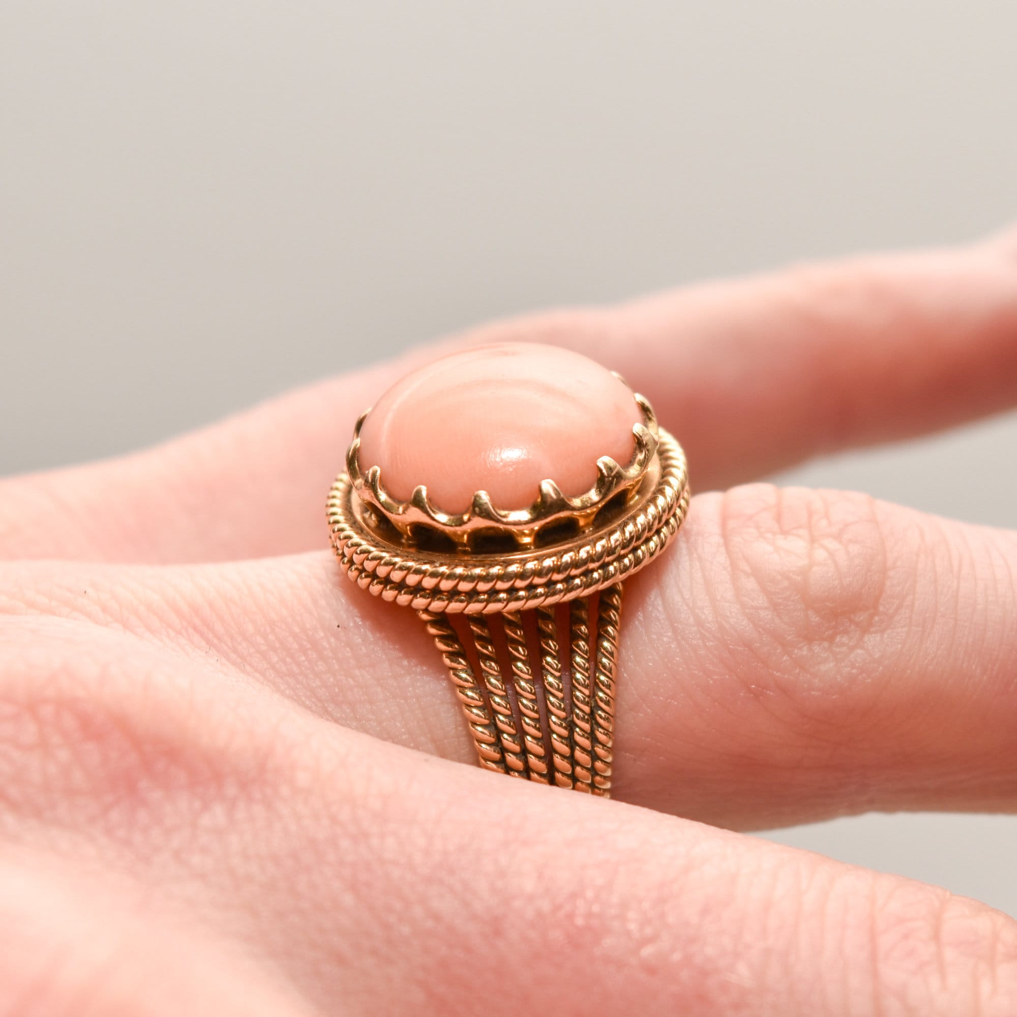 Estate Angel Skin Coral Cocktail Ring in 18K Yellow Gold with Woven Band on Finger, Size 6.25 US